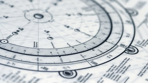 Black and white astrological chart diagram showing planetary placements and aspect lines used in birth chart interpretation